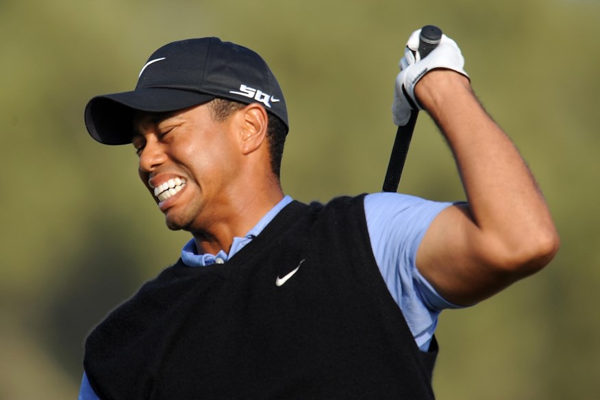 Tiger Woods winces after hitting a shot during the 2008 US Open.