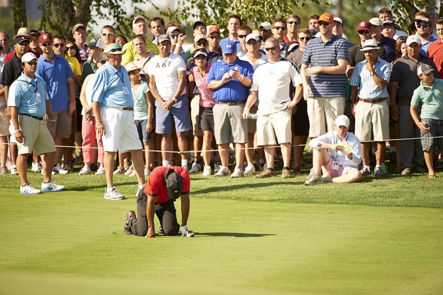 Tiger Woods suffered back spasms at the 2013 Barclays.
