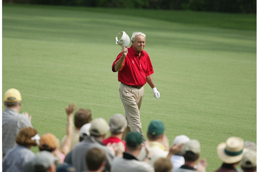 Arnold Palmer waves goodbye to The Masters in 2004.