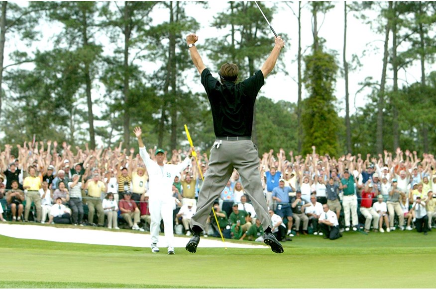 Phil Mickelson celebrates holing a birdie putt to win the 2004 Masters.