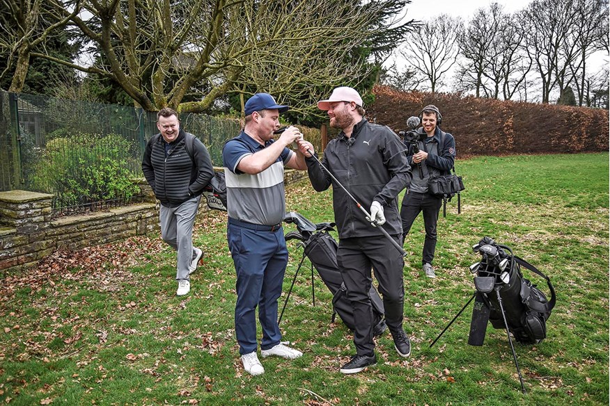 Tubes and Ange share a laugh on the golf course while filming for their YouTube channel.