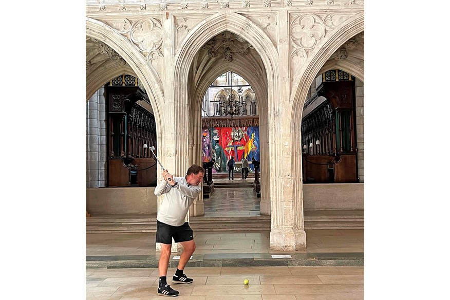 David Sullivan playing golf inside Salisbury Cathedral