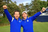 Graeme McDowell and fellow Northern Irishman Rory McIlroy celebrate winning the 2014 Ryder Cup.