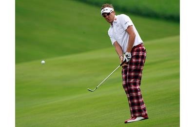 Iam Poulter wearing bright checked trousers at Wentworth