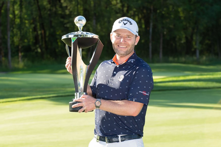 Branden Grace with his trophy after winning the LIV Golf Invitational Portland.