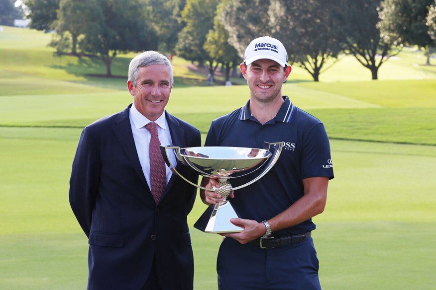 FedEx Cup champion Patrick Cantlay with Jay Monahan