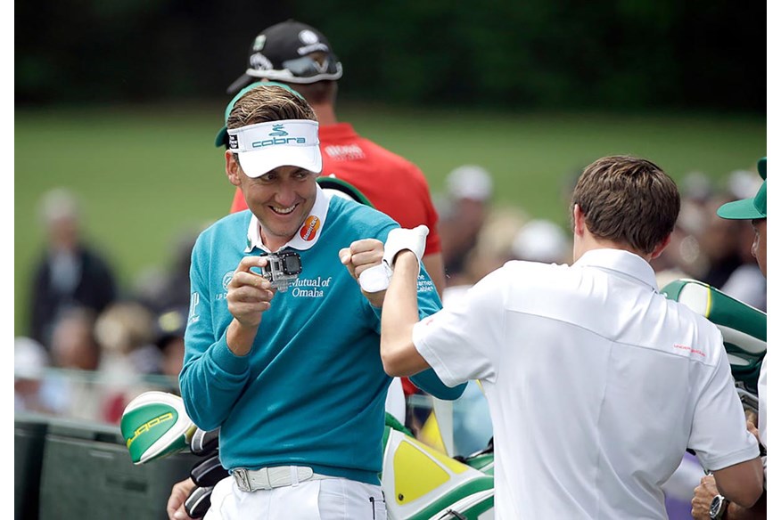 Sharing a laugh with Ian Poulter on his Masters debut in 2014.