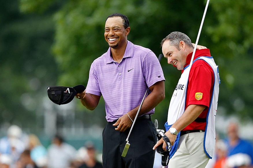 Sharing a laugh with Tiger Woods.