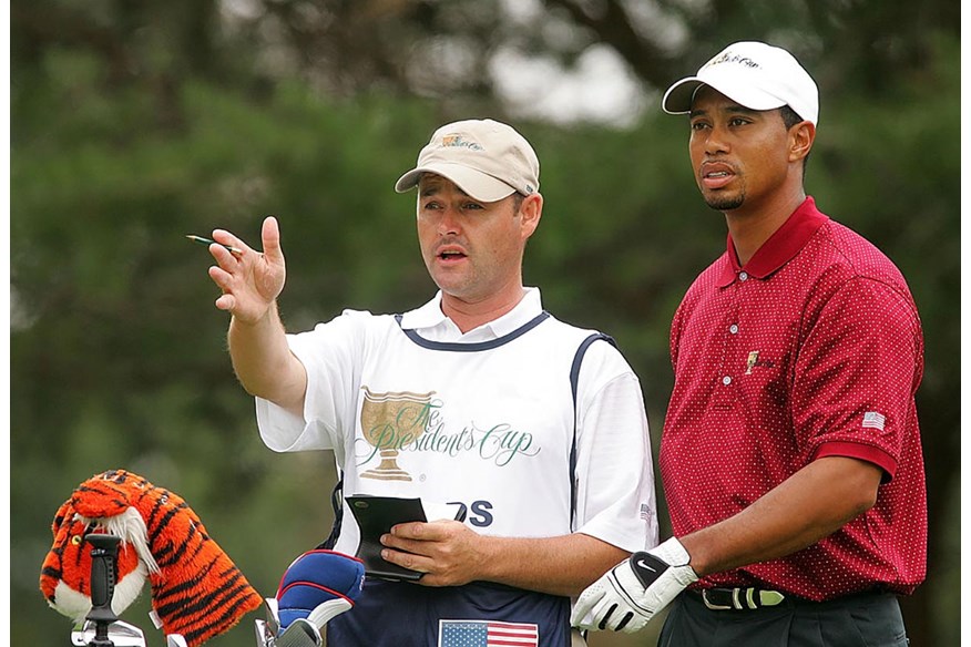 Caddying for Tiger Woods at the Presidents Cup in 2005.