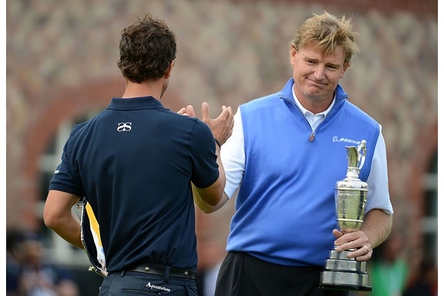 Adam Scott congratulates Ernie Els at the 2012 Open.