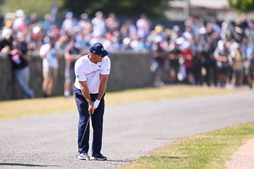 Bryson DeChambeau plays his 3rd shot from the road next to the 17th hole at St Andrews during the 3rd round of the 150th Open.