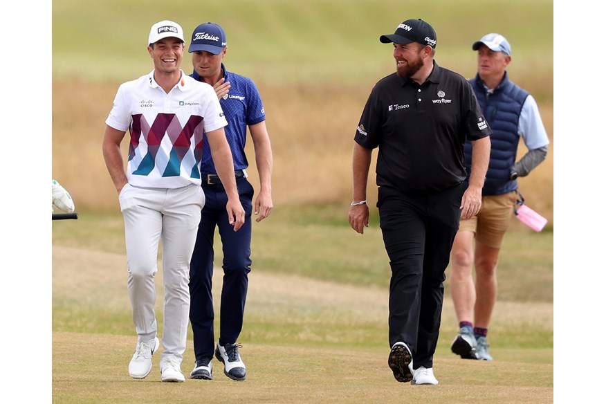 Viktor Hovland walks down the fairway with Shane Lowry and Justin Thomas at the 2022 Open.