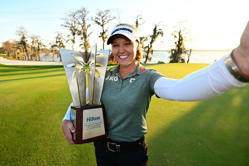 Brooke Henderson with the Hilton Grand Vacations Tournament of Champions Trophy.