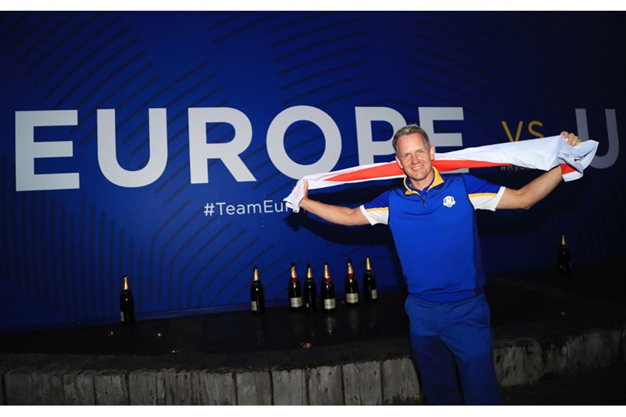 Luke Donald celebrates Europe 2018 Ryder Cup victory.