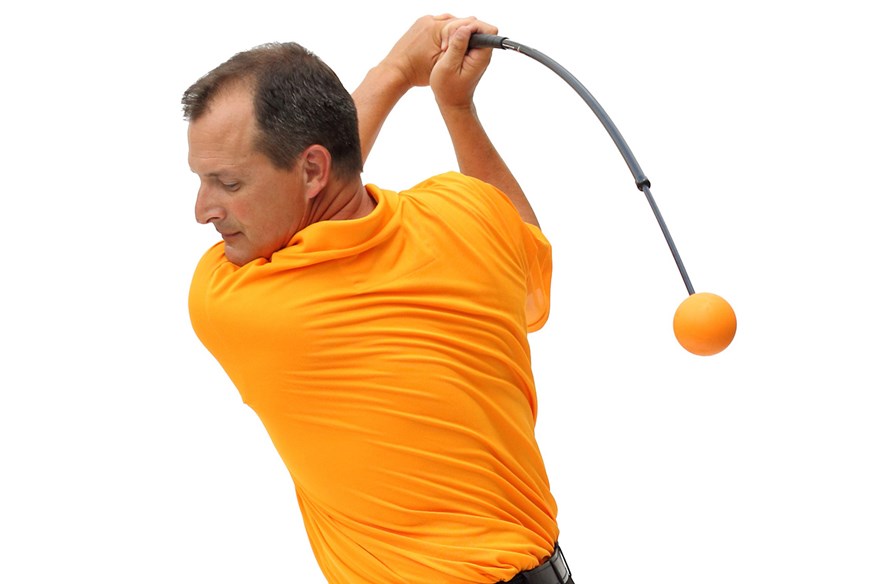 John Robins has been using the orange whip training aid to end his golf slump.