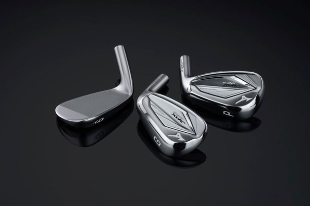 Three Mizuno JPX923 iron heads