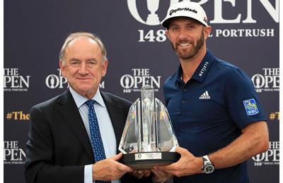 Official World Golf Rankings Chairman Peter Dawson presents Dustin Johnson with the OWGR McCormack Award at the 2019 Open.