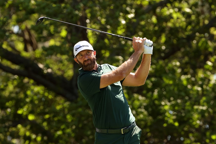 Dustin Johnson hits fairway wood at Augusta National 2024