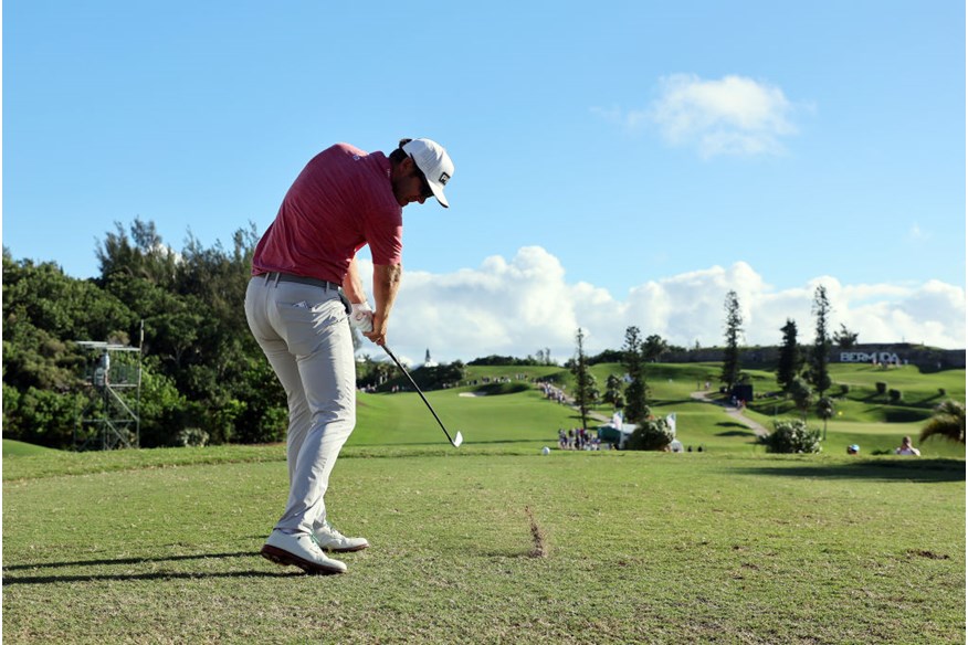 Seamus power hitting an iron on his way to victory at the 2022 Bermuda Championship.