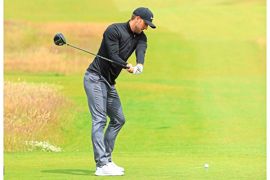 Halfway back in Harry Kane's golf swing.