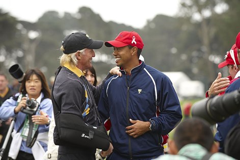Greg Norman and Tiger Woods in happier times at the 2009 Presidents Cup.