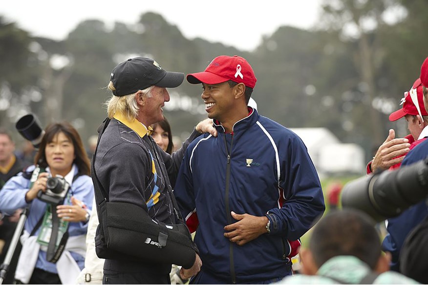 Greg Norman and Tiger Woods in happier times at the 2009 Presidents Cup.