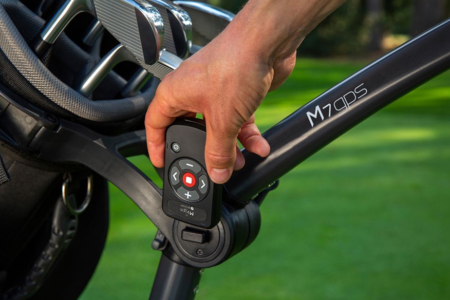 The Motocaddy M7 GPS remote attaches to the trolley.