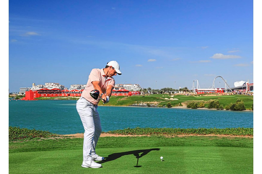 Rory McIlroy keeps the trail arm straight in his takeaway