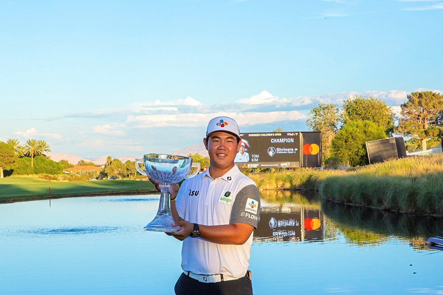 Tom Kim celebrates after winning the Shriners Children's Open