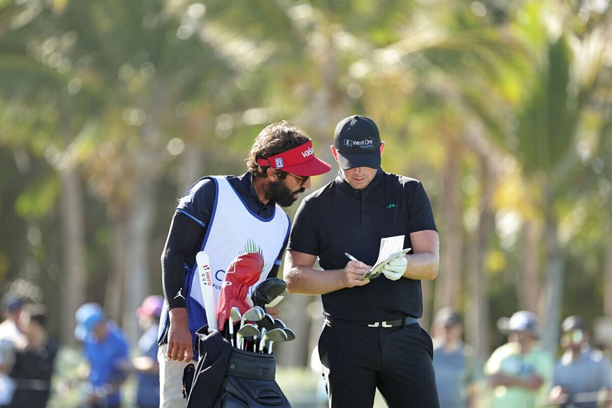 J.Lindeberg ambassador Matt Wallace with his caddie Sam Bernard.