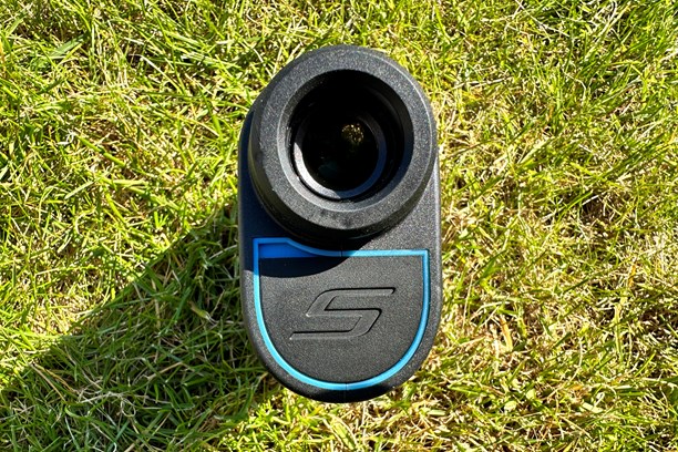 The viewfinder and battery compartment on the Shot Scope Pro L2 Laser Rangefinder.