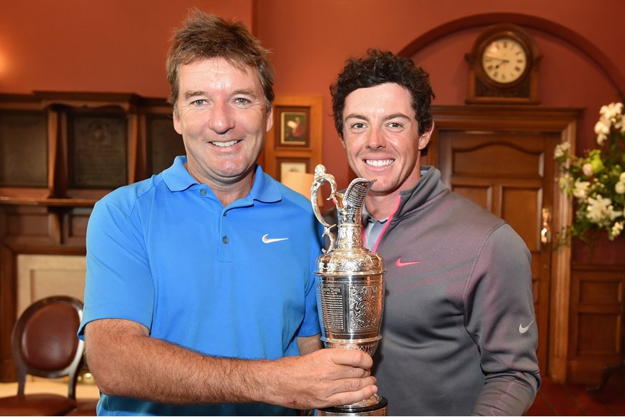 Rory McIlroy and JP Fitzgerald pose with the Claret Jug after winning The Open in 2014.