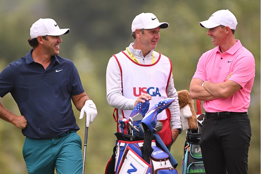 Brooks Koepka and Rory McIlroy share a laugh during a practice round at the US Open.