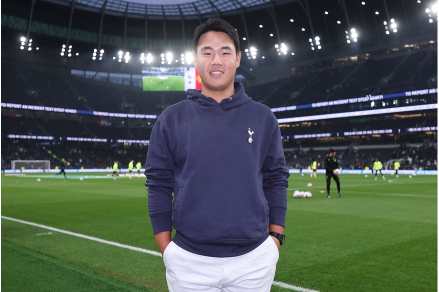 Golfer Tom Kim at Tottenham Hotspur's stadium.