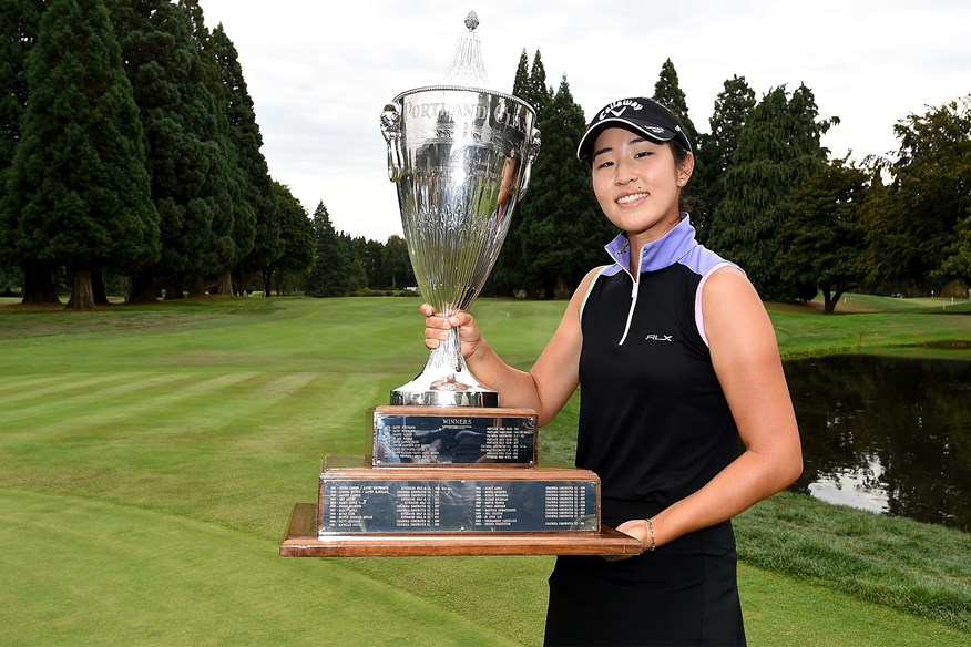 Andrea Lee lifting the trophy after winning the 2022 Portland Classic