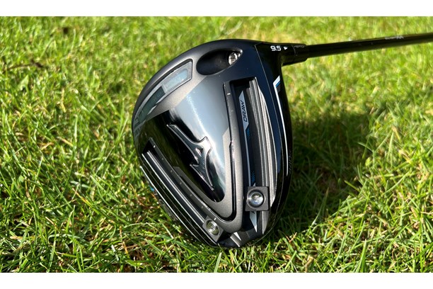 The Mizuno ST G driver sole weights set-up in a forgiving back position