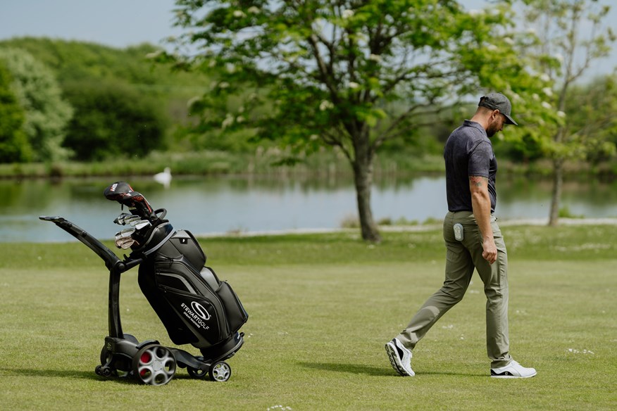 Using an electric trolley burns a similar amount of calories to carrying your bag.