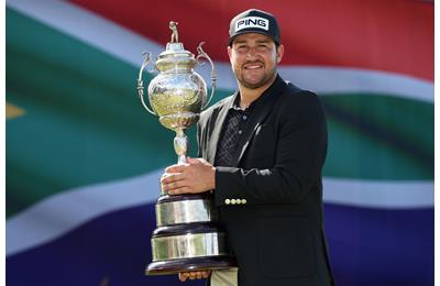 Thriston Lawrence lifts the 2022 Investec South African Open.