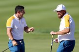 Rory McIlroy and Shane Lowry share a laugh at the Ryder Cup in Rome.