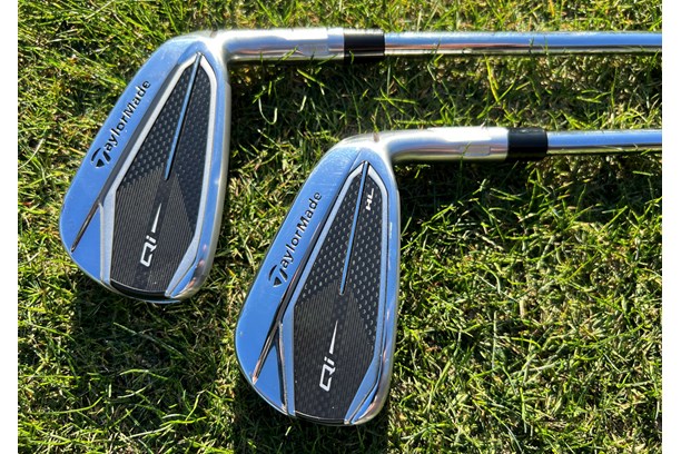 The TaylorMade Qi and Qi HL irons along side each other