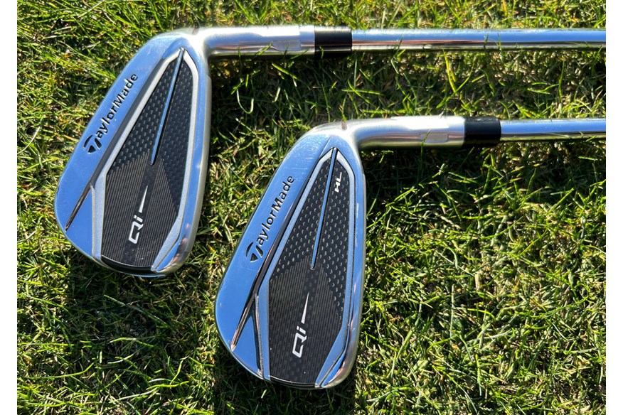 The TaylorMade Qi and Qi HL irons along side each other