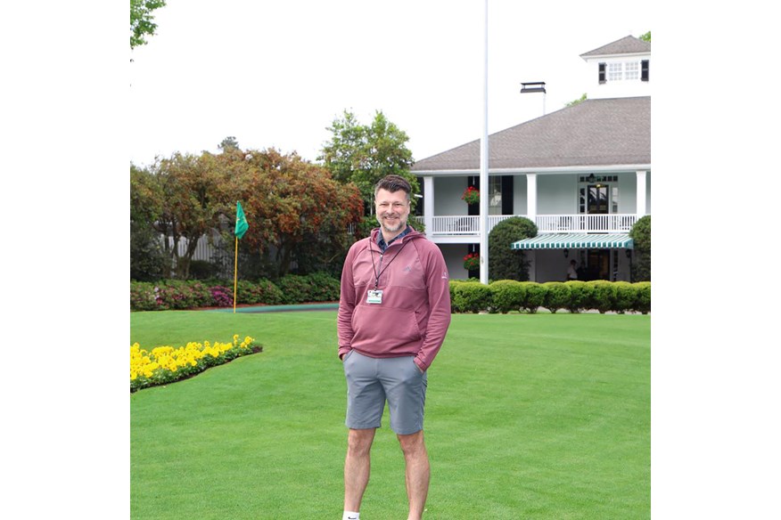 Rob Jerram poses outside Augusta National's famous clubhouse