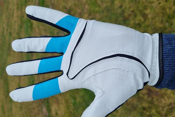 The non-slip silicon grip of the True Grip glove