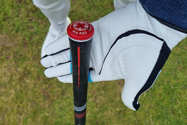 Aligning the True Grip glove along the blue finger channel