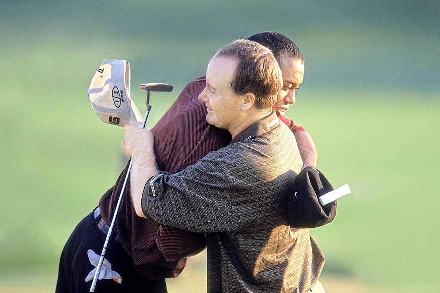 Bob May and Tiger Woods embrace after their battle at Valhalla in 2000