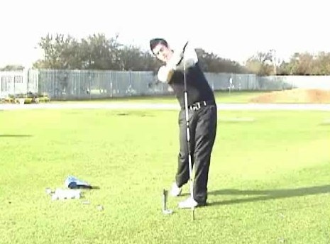 Now take your normal backswing but slow it down and keep it controlled so when you come through the ball you can easily visualise where your hands should finish in front of you