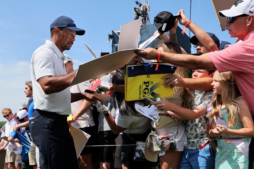 Tiger Woods signs autographs ahead of the 2024 PGA Championship