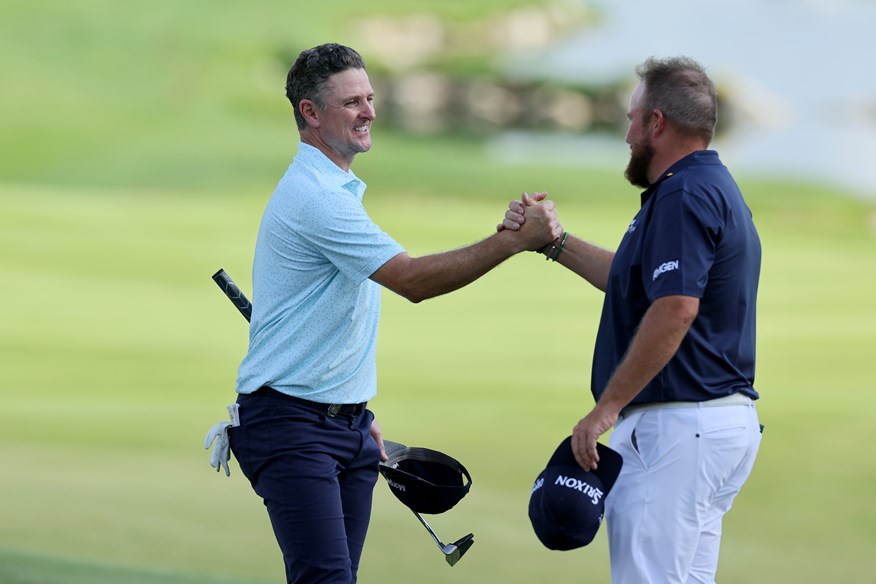 Shane Lowry is congratulated by Ryder Cup teammate Justin Rose after shooting 62 in the PGA Championship at Valhalla.