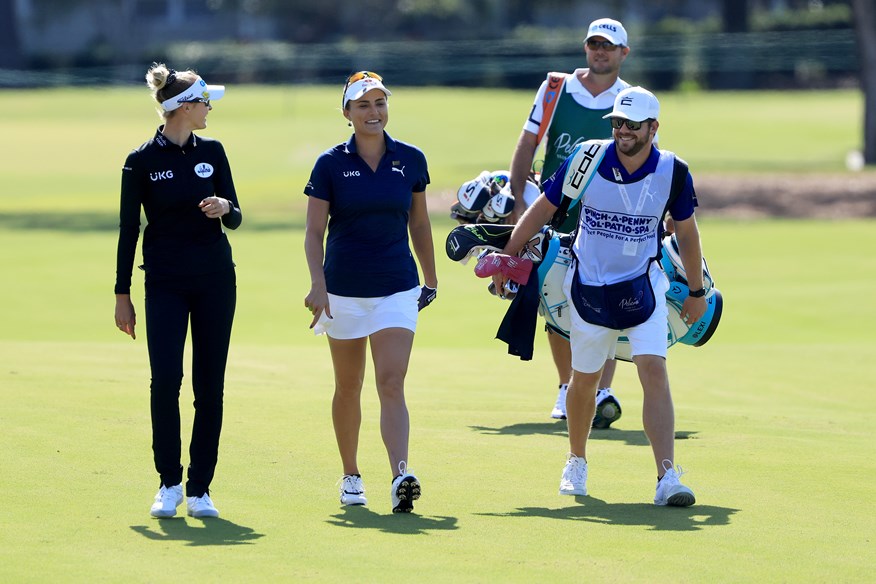 Nelly Korda and Lexi Thompson share a joke at the Pelican Women's Championship in 2021.