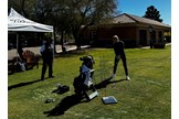 Butch Harmon casts his eye over Iona Stephen's swing.